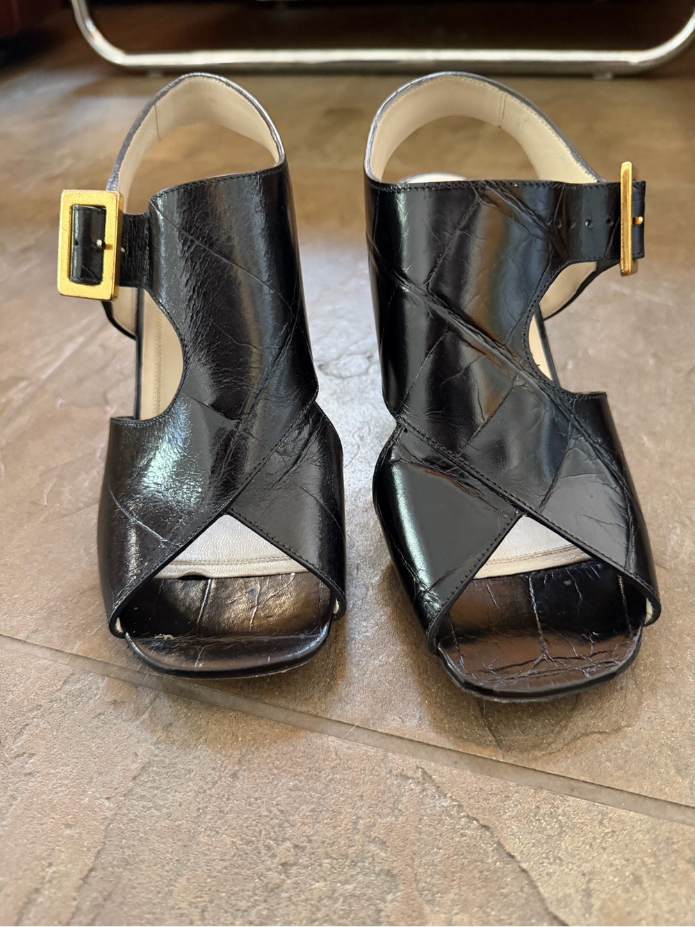 Celine Black Leather Crisscross Open-Toe Heels with Gold Buckle
Made in Italy